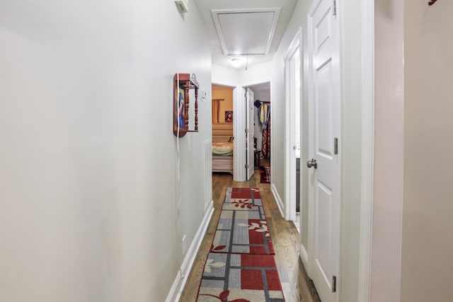 304 Baronswood Dr, Nolensville, TN 37135 - corridor featuring attic access, wood finished floors, and baseboards