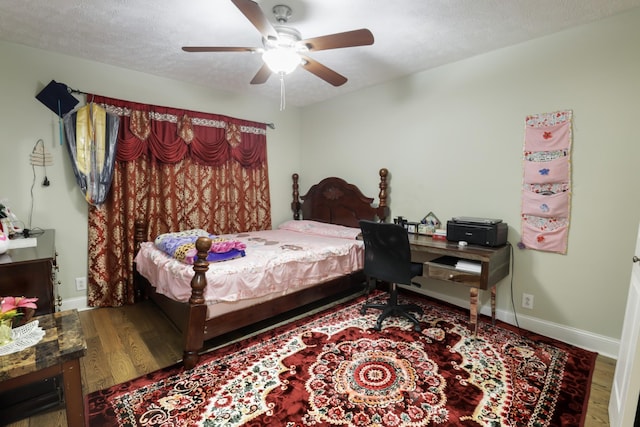 304 Baronswood Dr, Nolensville, TN 37135 - bedroom with wood finished floors, ceiling fan, baseboards, and a textured ceiling