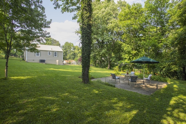 125 Neese Dr, Nashville, TN 37211 - view of green lawn with a patio and central air condition unit