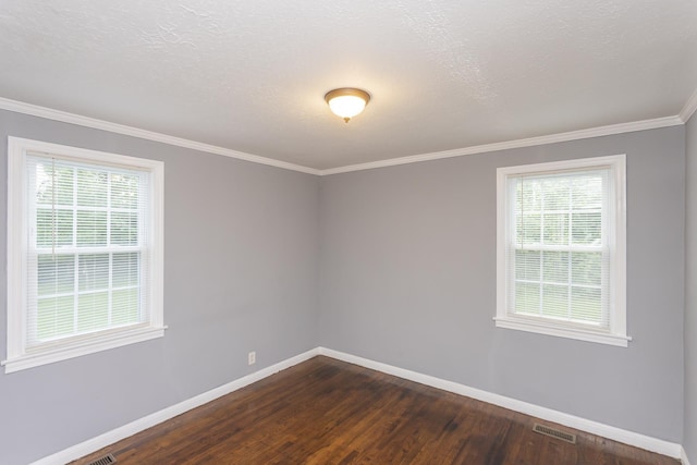 125 Neese Dr, Nashville, TN 37211 - empty room featuring baseboards, dark wood-style floors, ornamental molding, and a textured ceiling