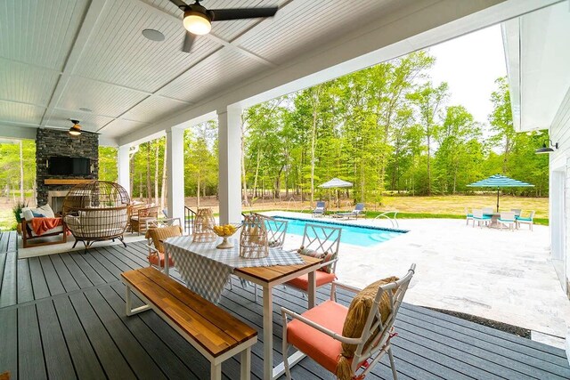 1 Old S Rd, Murfreesboro, TN 37128 - wooden terrace featuring ceiling fan, outdoor dining area, a patio, and an outdoor pool