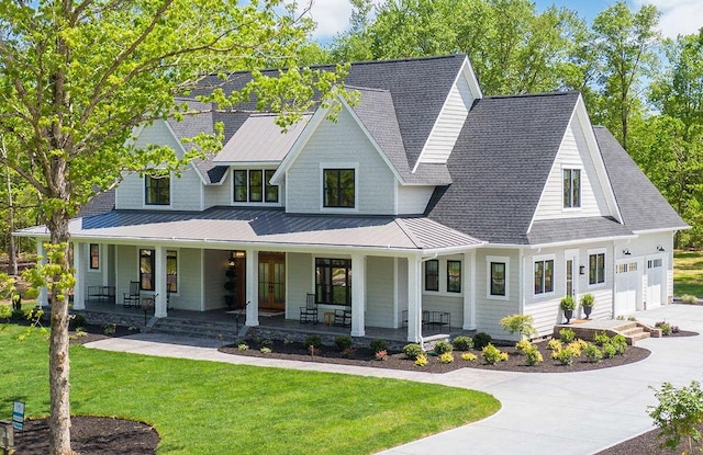 1 Old S Rd, Murfreesboro, TN 37128 - modern farmhouse style home with a standing seam roof, concrete driveway, a porch, a front lawn, and metal roof