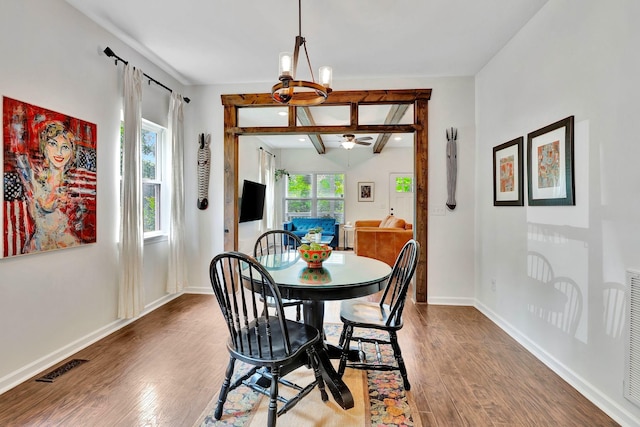 2639 Distillery Rd, Greenbrier, TN 37073 - dining space featuring wood finished floors, baseboards, a ceiling fan, and a chandelier
