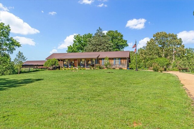 2890 Nance Bend Rd, Clifton, TN 38425 - ranch-style home with a front yard, a porch, and metal roof