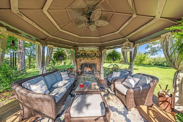 2890 Nance Bend Rd, Clifton, TN 38425 - view of patio / terrace featuring a gazebo, an outdoor living space with a fireplace, and a ceiling fan