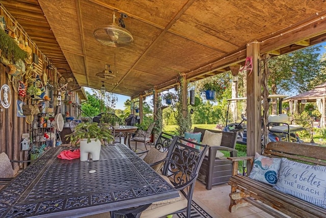 2890 Nance Bend Rd, Clifton, TN 38425 - view of patio featuring outdoor dining area and an outdoor living space