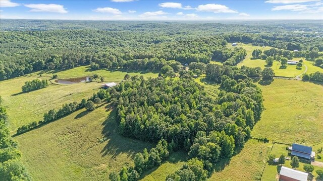 2890 Nance Bend Rd, Clifton, TN 38425 - drone / aerial view of a heavily wooded area