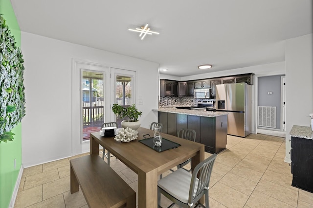 5009 Lanier Dr, Greenbrier, TN 37073 - dining area featuring light tile patterned floors and baseboards