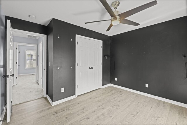 5009 Lanier Dr, Greenbrier, TN 37073 - unfurnished bedroom featuring light wood-style floors, a closet, baseboards, and ceiling fan