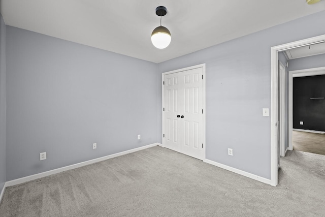 5009 Lanier Dr, Greenbrier, TN 37073 - unfurnished bedroom with attic access, carpet flooring, baseboards, and a closet
