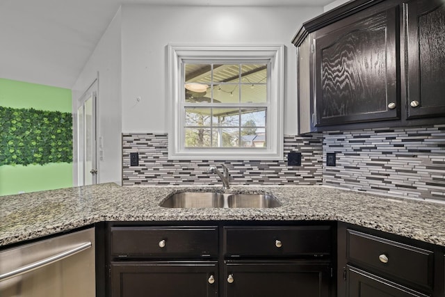 5009 Lanier Dr, Greenbrier, TN 37073 - kitchen with a sink, dishwasher, tasteful backsplash, and light stone counters