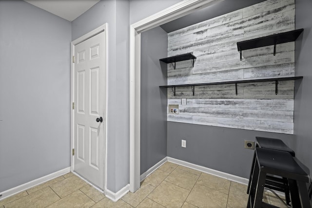 5009 Lanier Dr, Greenbrier, TN 37073 - interior space with electric dryer hookup, hookup for a washing machine, tile patterned floors, and baseboards