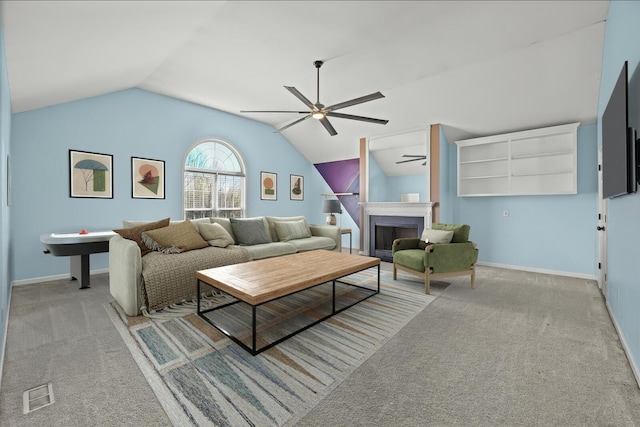 5009 Lanier Dr, Greenbrier, TN 37073 - living room with a ceiling fan, carpet floors, lofted ceiling, baseboards, and a fireplace