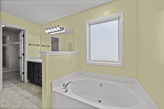 5009 Lanier Dr, Greenbrier, TN 37073 - bathroom featuring healthy amount of natural light, vanity, and a garden tub