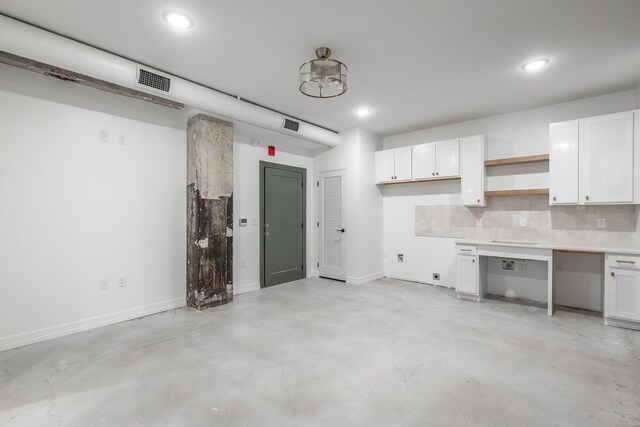 117 E 7th St Unit 207, Chattanooga, TN 37402 - garage featuring recessed lighting and baseboards
