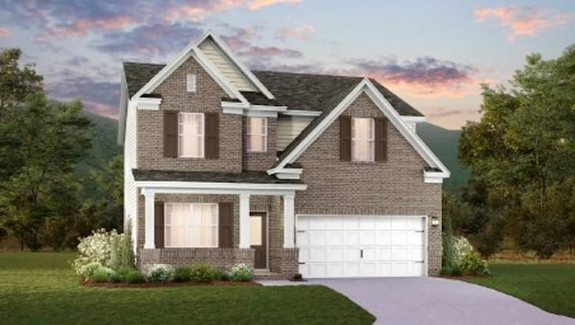 2413 Williams Ridge Dr, Columbia, TN 38401 - craftsman-style home featuring a garage, concrete driveway, a front lawn, and covered porch