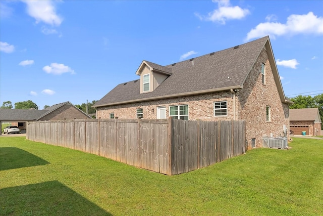 1020 Corey Dr, Lewisburg, TN 37091 - rear view of property featuring brick siding, a shingled roof, and central AC unit