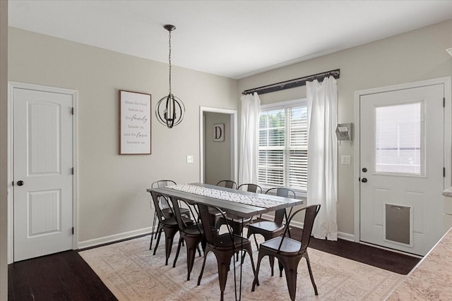 1020 Corey Dr, Lewisburg, TN 37091 - dining area with wood finished floors, baseboards, and a chandelier