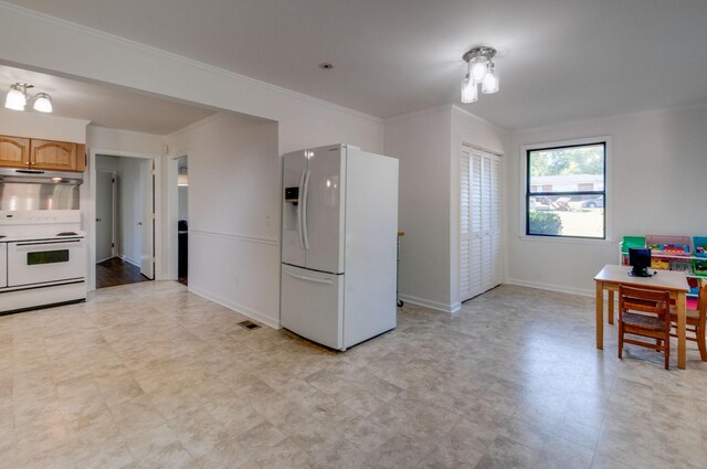 930 Havenhill Dr, Nashville, TN 37217 - kitchen featuring white appliances, under cabinet range hood, crown molding, light flooring, and baseboards