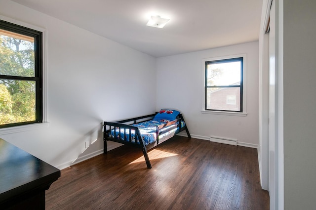 930 Havenhill Dr, Nashville, TN 37217 - bedroom featuring multiple windows, wood finished floors, baseboard heating, and baseboards