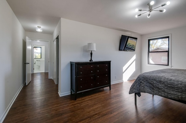 930 Havenhill Dr, Nashville, TN 37217 - bedroom featuring wood finished floors, a chandelier, and baseboards