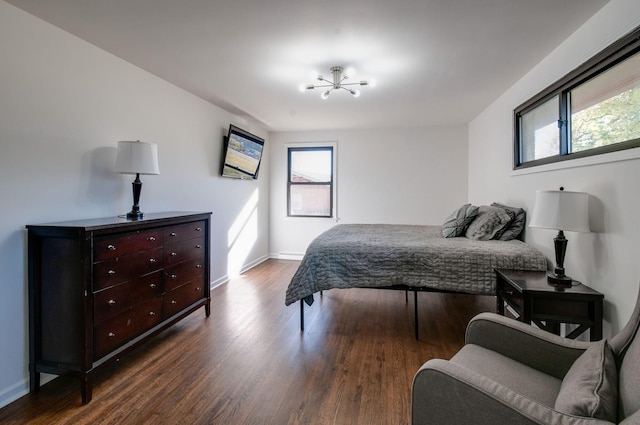 930 Havenhill Dr, Nashville, TN 37217 - bedroom with multiple windows, dark wood-style flooring, baseboards, and a chandelier