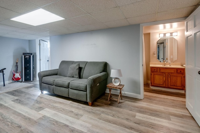 930 Havenhill Dr, Nashville, TN 37217 - living area with light wood finished floors, a paneled ceiling, and baseboards