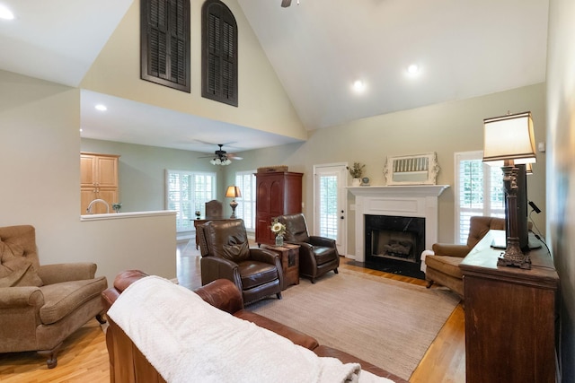 1513 Bunbury Dr, Thompsons Station, TN 37179 - living room with ceiling fan, light wood-style flooring, a high end fireplace, high vaulted ceiling, and recessed lighting