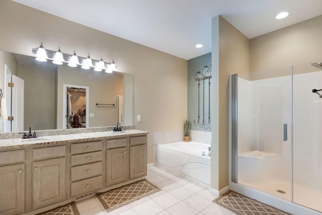 1513 Bunbury Dr, Thompsons Station, TN 37179 - bathroom with tile patterned floors, a shower stall, a garden tub, double vanity, and a walk in closet