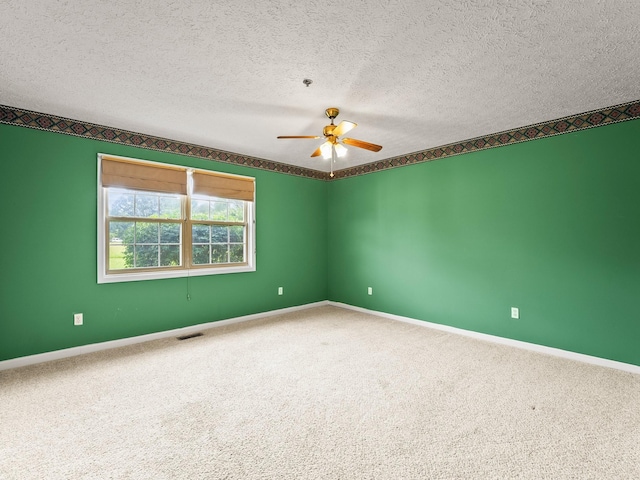 1611 Lincoln St W, Tullahoma, TN 37388 - carpeted empty room featuring a ceiling fan and a textured ceiling