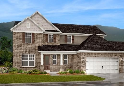 2456 Williams Ridge Dr, Columbia, TN 38401 - view of front of house with brick siding, driveway, a garage, and a front lawn