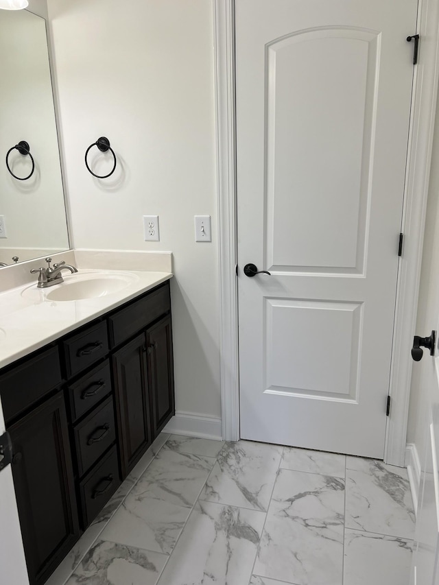 2124 Skyglen Trce, Antioch, TN 37013 - bathroom featuring vanity, baseboards, and marble finish floors