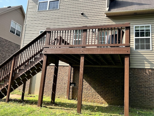 2124 Skyglen Trce, Antioch, TN 37013 - back of property with a deck, stairs, and brick siding