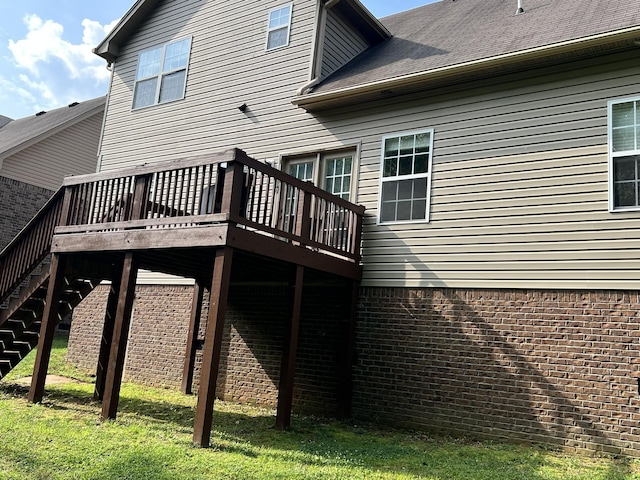 2124 Skyglen Trce, Antioch, TN 37013 - back of property with a wooden deck, stairs, and brick siding