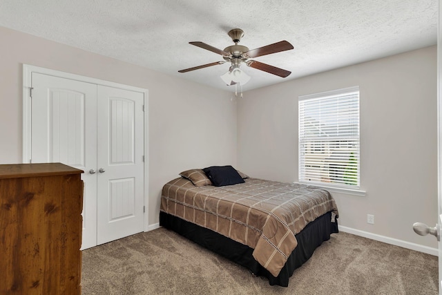 905 Azeri Ave, Murfreesboro, TN 37128 - bedroom featuring carpet floors, baseboards, a closet, a textured ceiling, and ceiling fan