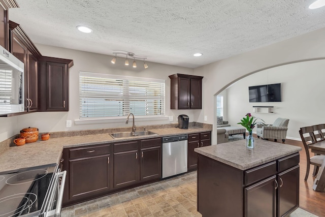 905 Azeri Ave, Murfreesboro, TN 37128 - kitchen with dishwasher, a sink, electric range oven, dark brown cabinetry, and healthy amount of natural light