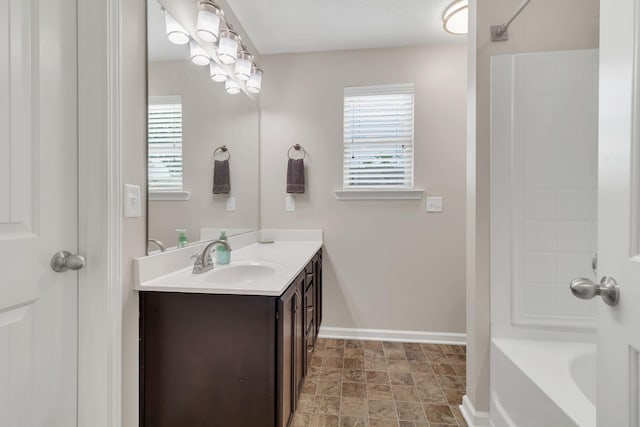 905 Azeri Ave, Murfreesboro, TN 37128 - bathroom with vanity, healthy amount of natural light, tub / shower combination, and baseboards