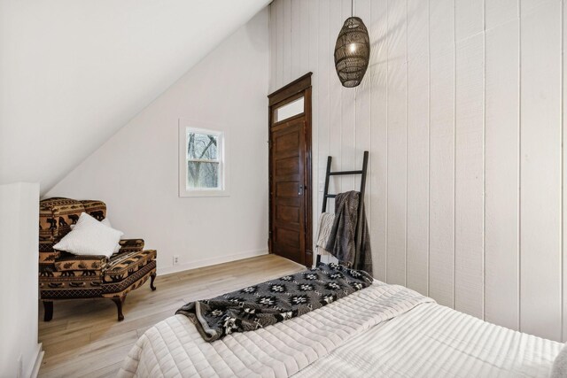 8861 Aunt Helen Rd, Silver Point, TN 38582 - bedroom with vaulted ceiling and light wood-style flooring