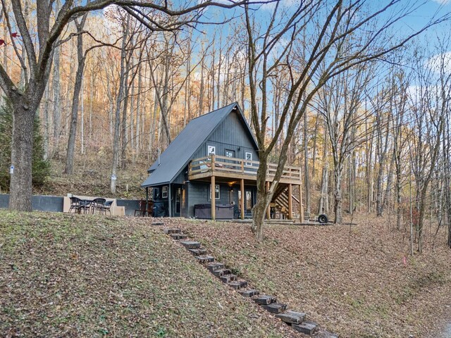 8861 Aunt Helen Rd, Silver Point, TN 38582 - view of front of property featuring stairway, a wooden deck, and a hot tub