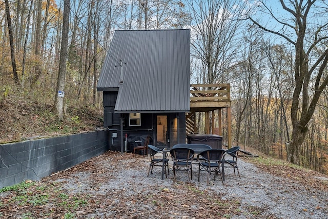 8861 Aunt Helen Rd, Silver Point, TN 38582 - rear view of property featuring metal roof and a deck