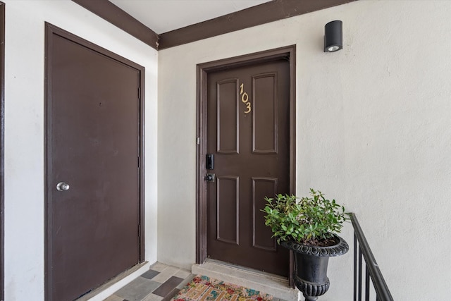 4505 Harding Pike Unit 103, Nashville, TN 37205 - view of exterior entry featuring stucco siding