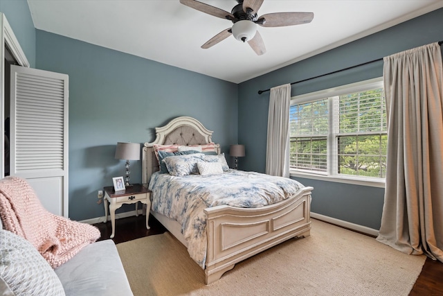 4505 Harding Pike Unit 103, Nashville, TN 37205 - bedroom featuring baseboards, light wood-style flooring, and ceiling fan