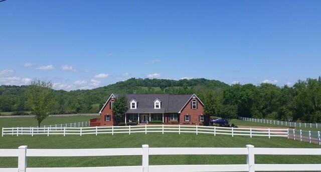 1446 Kittrell Rd, Franklin, TN 37064 - view of front of home with a rural view and a forest view