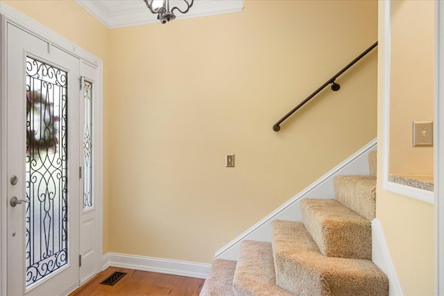 1446 Kittrell Rd, Franklin, TN 37064 - foyer entrance featuring light wood-style floors, ornamental molding, and stairs
