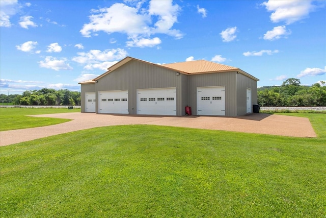 1446 Kittrell Rd, Franklin, TN 37064 - view of front of property featuring an outdoor structure, a front yard, a detached garage, and driveway