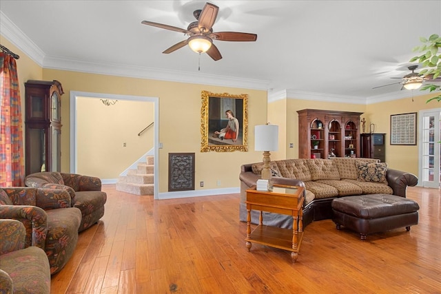 1446 Kittrell Rd, Franklin, TN 37064 - living room with ceiling fan, stairway, crown molding, and light wood-type flooring