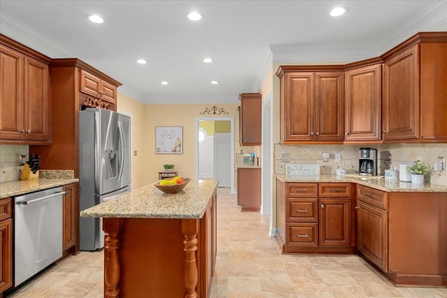 1446 Kittrell Rd, Franklin, TN 37064 - kitchen with appliances with stainless steel finishes, recessed lighting, brown cabinets, tasteful backsplash, and crown molding