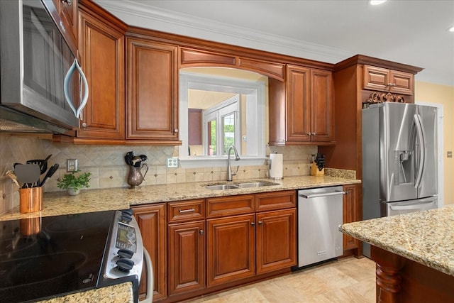 1446 Kittrell Rd, Franklin, TN 37064 - kitchen featuring stainless steel appliances, light stone countertops, decorative backsplash, brown cabinetry, and recessed lighting