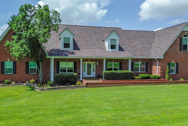 1446 Kittrell Rd, Franklin, TN 37064 - cape cod house featuring brick siding, a front lawn, and covered porch