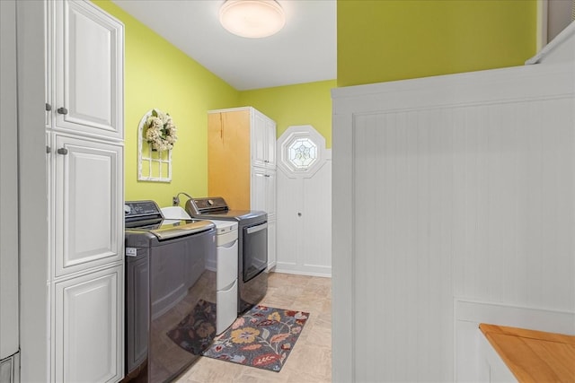 1446 Kittrell Rd, Franklin, TN 37064 - laundry room with washer and clothes dryer and cabinet space